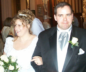 Andrea and Neil walk down the aisle