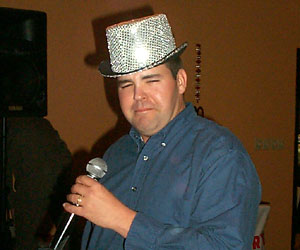 Why did the DJ put this stupid hat on my head? - Neil