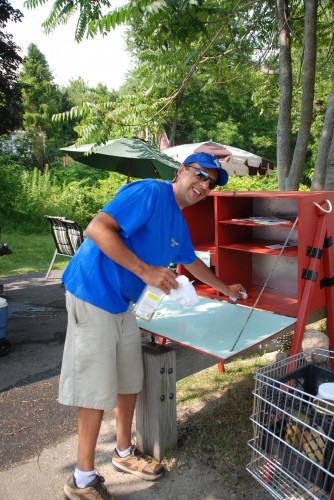 Hot Dog Man setting up the condiment area.