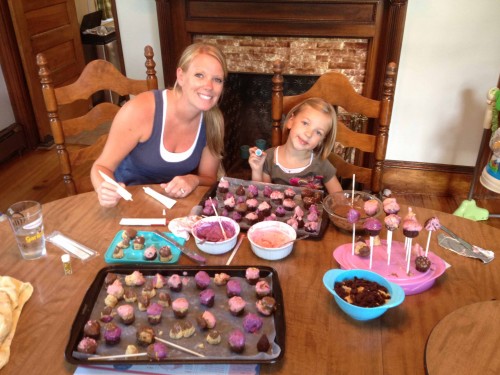 Shelby and Eva making cake pops