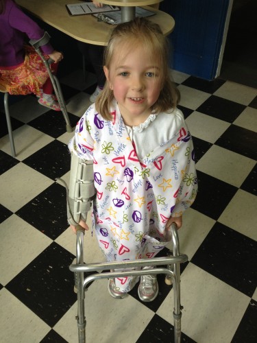 Eva playing the Doctor's Office at the Children's Museum