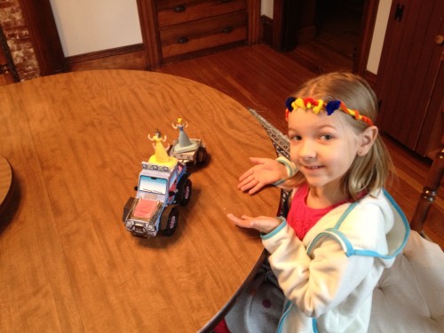 Eva using the ATV to haul princesses around