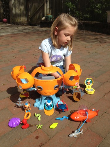 Eva playing with her Octonauts