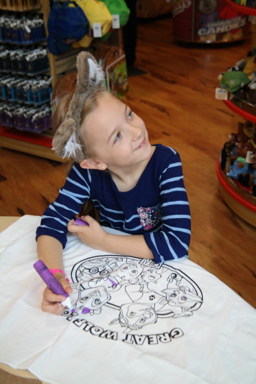 Eva coloring a pillow case at Great Wolf Lodge New England