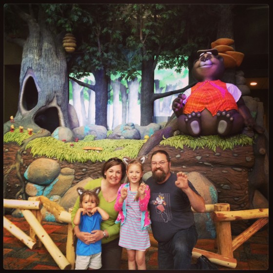 Family photo in the lobby of Great Wolf Lodge New England