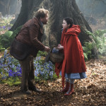 INTO THE WOODS - James Corden as the baker and Lilla Crawford as Little Red Riding Hood