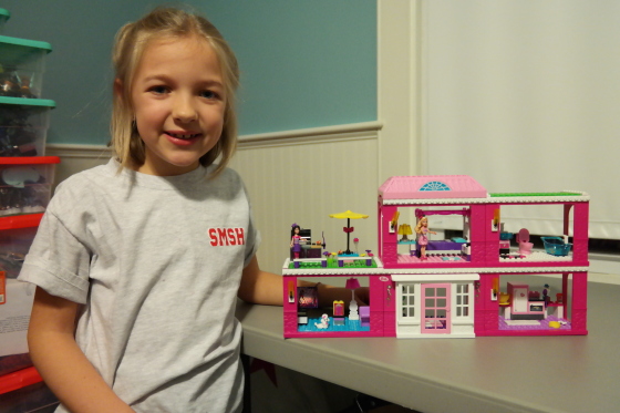 Eva with the completed MEGA Bloks Barbie Fab Mansion