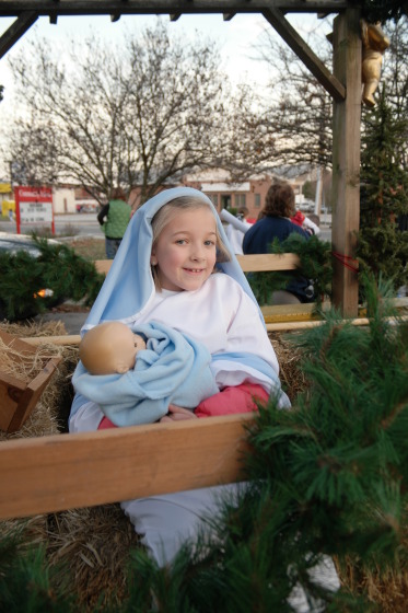 Eva as Mary on her school's parade float.