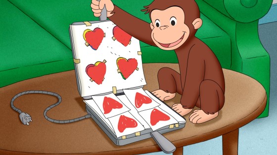 Curious George makes a printing press from a waffle iron.