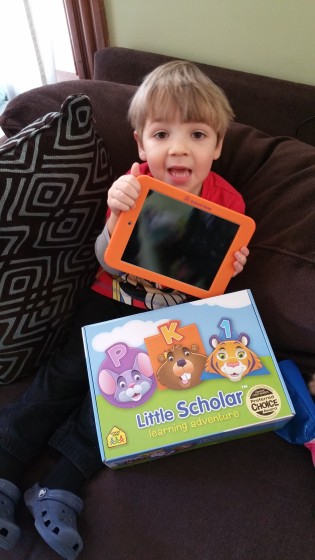 Andrew with his Little Scholar Tablet