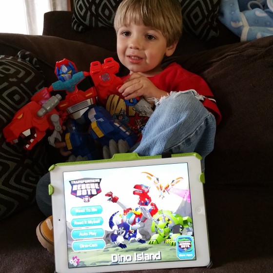 Playing with the Transformers Rescue Bots Dino Island App and Optimus Primal