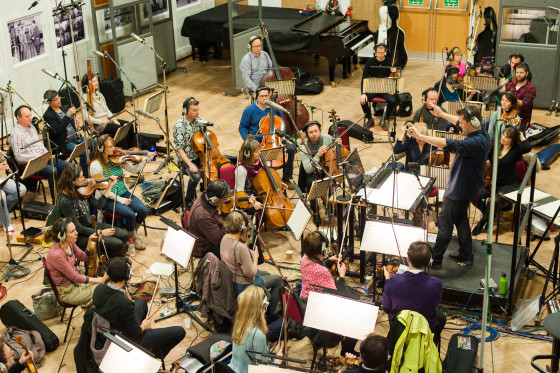 Wide view of Philip Sheppard conducting the orchestra