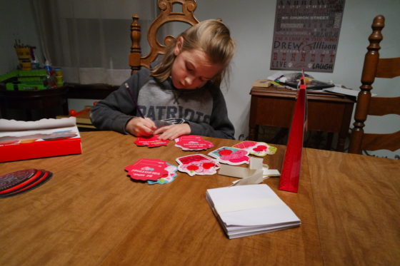 Eva writing Valentines Cards