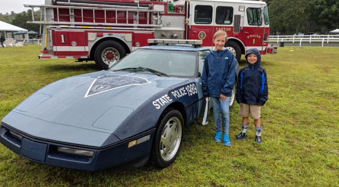 The kids check out the MSP Corvette