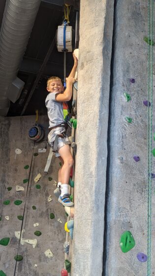 Dylan climbing