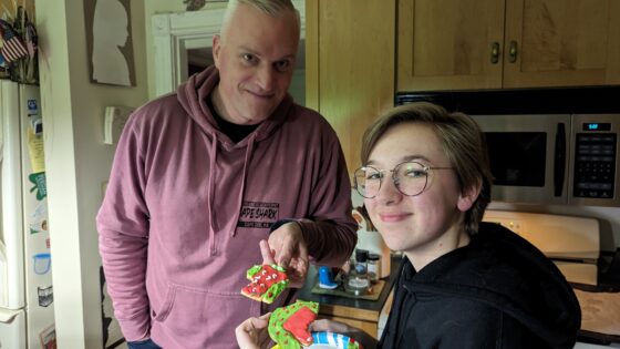 Uncle Erik and Eva with Ugly Sweater Cookies