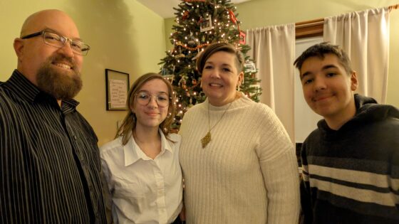 Family by the Christmas Tree